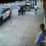 Bystanders Argue with Police Officers, Ambulance Arrives - Surveillance Video